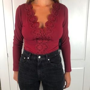 Red lace body suit